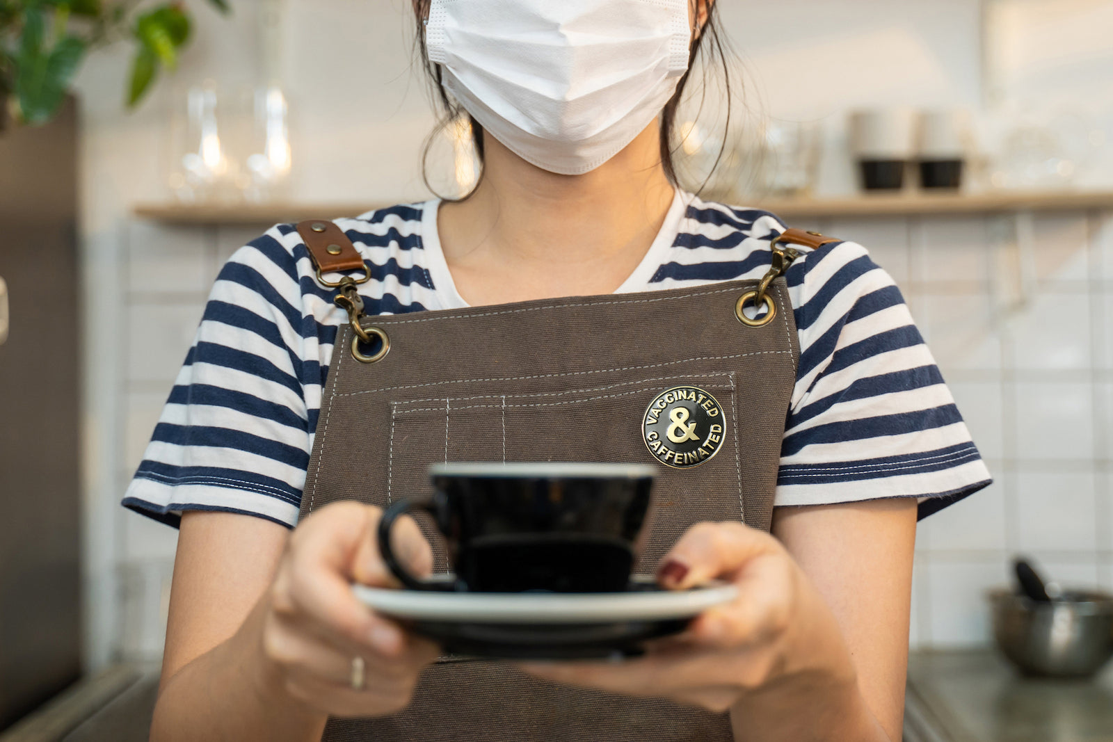 Coffee Brands- Barista serves you coffee